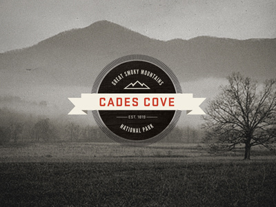 Cades Cove Cover badge environmental graphics mountains signage trademark