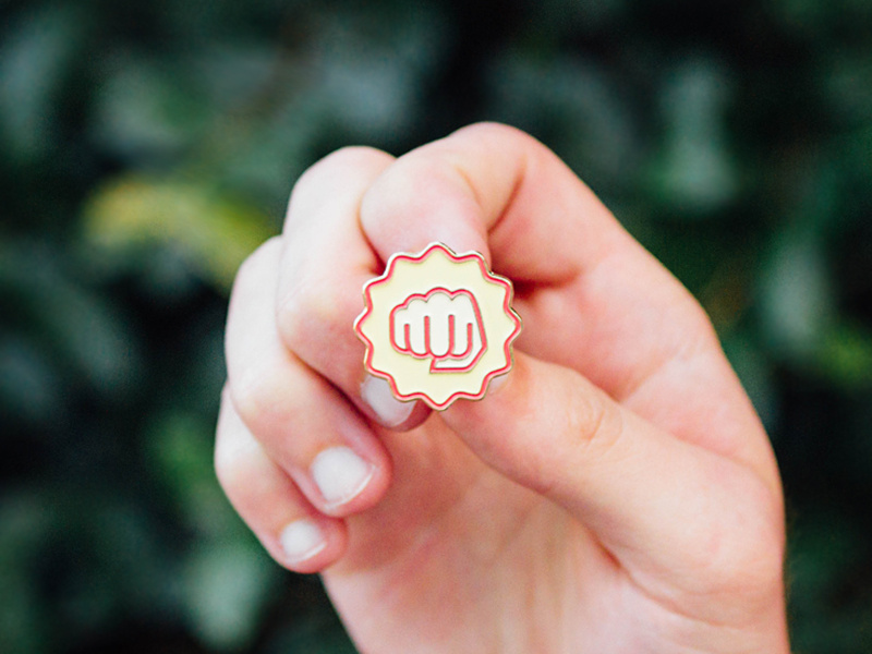 👊 👊 trace identity brand red gold bump icon fist pin enamel