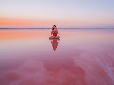 Yoga on pink lake