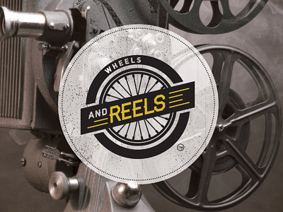 Wheels & Reels bike black design festival film graphic identity logo print reel wheel yellow
