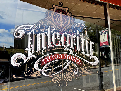 Integrity Tattoo hand lettering logotype sign windowsignage