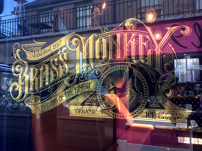Brass Monkey window brass ice cream lettering monkey schmetzer signage window