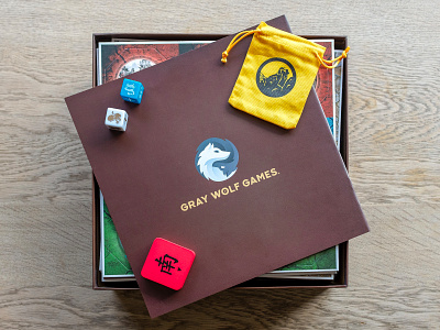 Gray Wolf Games In Real Life animal boardgame boardgames gradient gray identity logo mark packaging design print pup wolf wolves wu wei yin yang