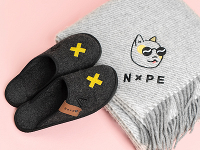 Warm and fuzzy blanket brand branding design embroidery identity logo office photography slippers swag warm