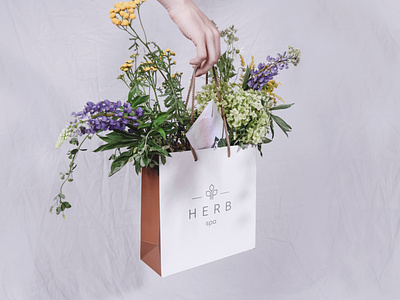 The best kind of gift bag 🌿 bag branding card design floral flowers gift goodie graphic herb identity logo minimal nature packaging paper present shadow simple spa