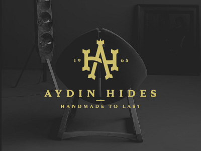 AYDIN Hides logo animal armchair chair company design furniture leather logo logo design rug skin stool