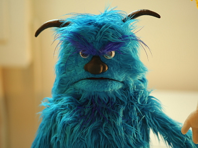 Grumpy blue puppet ad character design commercial grumpy illustration puppet puppet studio