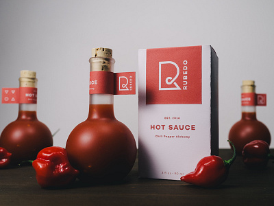 Rubedo alchemy hot sauce identity logo packaging potion rubedo