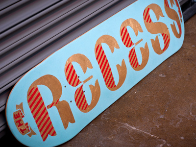 Recess Deck Close Up gold leaf skateboard type