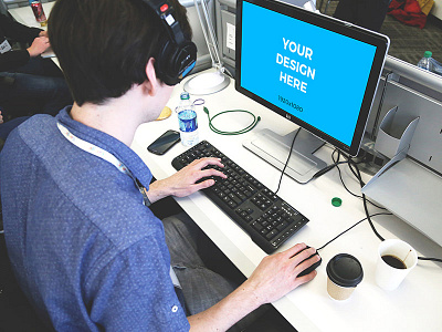 Man with headphones working on desktop computer desktop free headphones man mockup windows