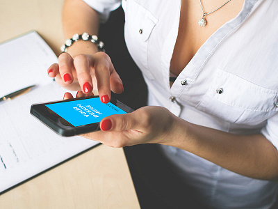 Woman working on black iPhone SE