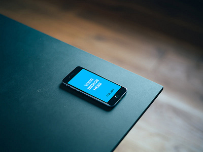 Black iPhone 6S in the corner of black table freebie iphone mockup online placeit smartmockups template tool