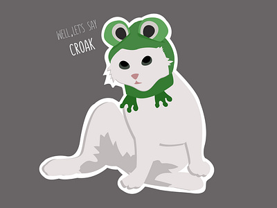 White cat lies in a frog hat "Well, let's say croak"