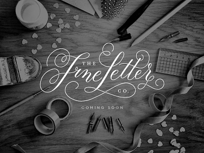 the fine letter co. black and white calligraphy flourish hand lettering handrawn landing page logo modern calligraphy photography table top the fine letter co. website