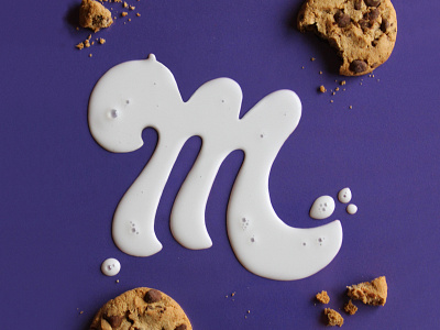 M — 36 Days of Type 36 days of type bubbles cookies lettering m milk physical purple spill tactile typography type typography