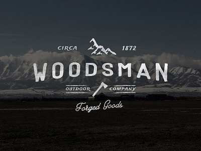 Woodsman Outdoor Company: Included in the Hand Drawn Pack badge crest lettering logo mountains retro texture typography vintage wordmark