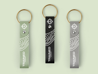 Trained Armor - Key Chain Design armory branding business card design graphic design illustration key chain logo merch merchandize mockup rustic stationery training typography ui ux vector weapons