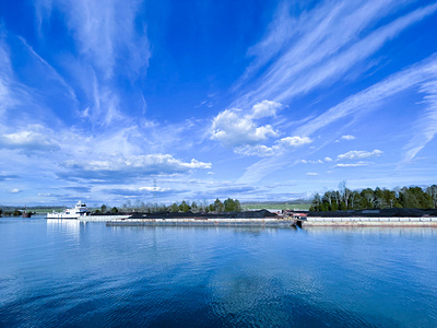 Electricity in the making. barge boat coal coal plant picture power tugboat