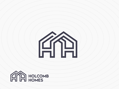 Holcomb Homes #2 dark grey home housing logo mortgage real estate