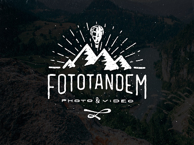 Fototandem logo aerostat couple logo logotype mountains photo tandem texture typemate video