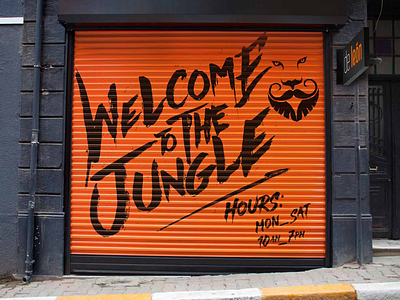 Deleón Barbershop – Storefront Design atlanta barber barbershop branding hand painted lion lion logo logo minimalist orange orange and black sign signage store storefront street urban