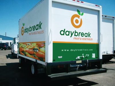 Daybreak Logo (On a Truck 2) d fruit green landon leaf logo orange presentation rick rick rick landon rick landon design target truck vector