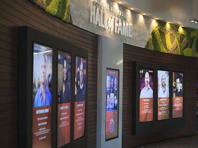 Hall of Fame Interactive Wall displays environmental design hall of fame interactive interior touchscreen video wall wall wood