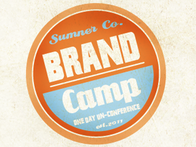 Brand Camp logo blue circle logo orange paper texture typography