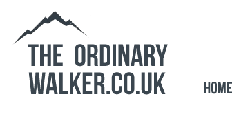 The Ordinary Walker logo logo mountain type