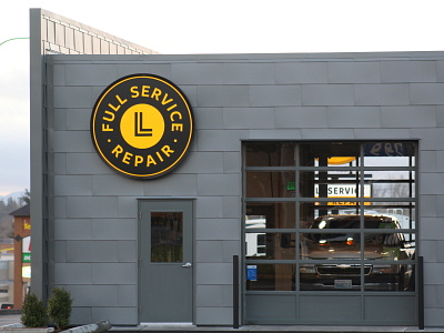 LL alternate sign black and yellow brandidentity logo monogram sign signage