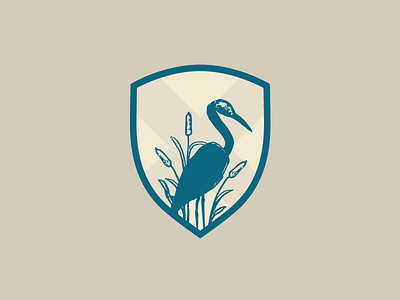 Shield logo alabama blue cattails cross heron logo shield