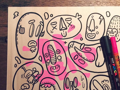 Monsters on wood doodle faces molotow monsters neon pink posca weird wood