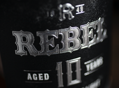 Rebel 10 Year bottle design label logo packaging spirits whiskey