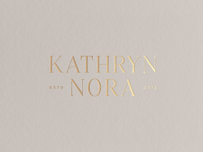 Typography Logo Design in Embossed Gold Foil on Card