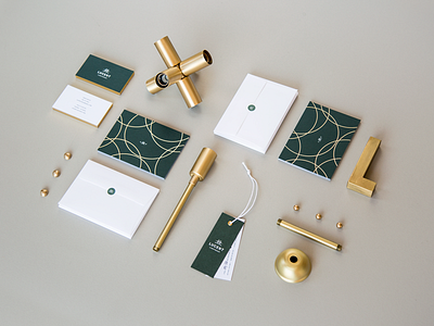 Lucent Collateral branding brass collateral gold foil print