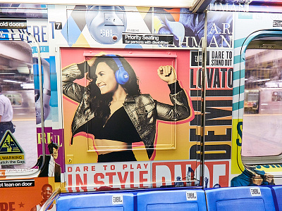 Demi Lovato Times Square Shuttle demi lovato headphones jbl layout music print subway train