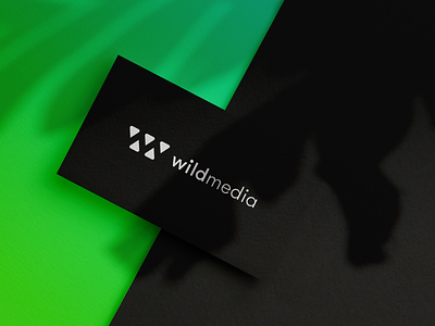 "WildMedia" custom logotype beast blackandwhite branding fangs green logo media minimal logo nature negative space teeth wild wild logo wm logo
