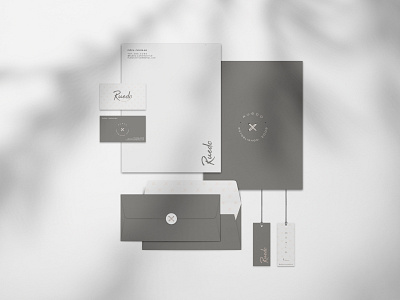 Stationary for Ruedo badge brand brand identity branding business cards design envelope design gray hang tags icon identity letterhead logo neutrals nudes stationary swing tags typography