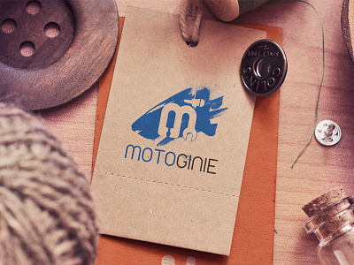 MotoGinie bike branding ginie logo mockup motor screwdriver typographic symbol