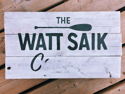The Watt Saik Cottage Sign paint typography wood