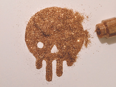 gold glitter skull bling thing