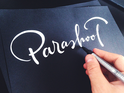 Parashoot custom flow house lettering light logo production type