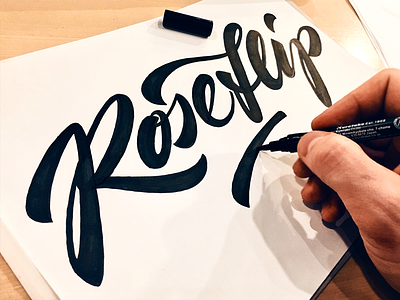 RoseHip custom food handwritten hip logo rose script. flow type urban vegan