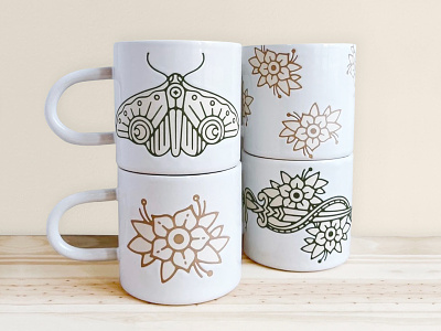Ceramic Collaboration badge design butterfly california ceramic logo ceramics collaboration cups dagger flower hand crafted illustration merch moth mugs nienowbrand palm tree snake snake dagger tattoo traditional