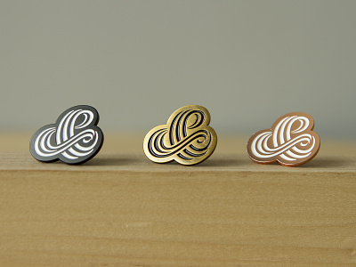 TriLine Pins are in ampersand design glyph goods lettering merch pin pin game pstype type typography
