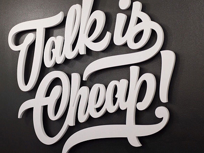 Talk is Cheap conference room lettering signage talk is cheap