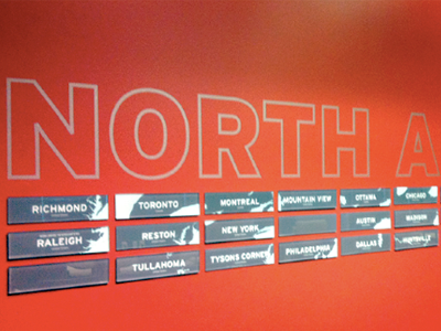 Red Hat Office Bricks global offices installation design red hat signage wall graphics