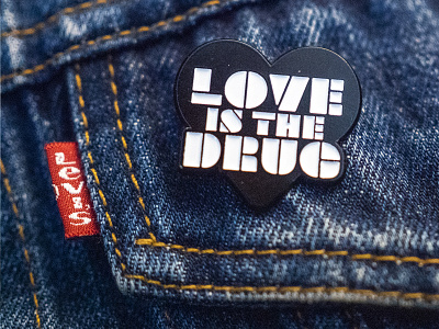 Love is a pin badge acid house black brand enamel graphic design house music love love is the drug merchandise metal minimal music pin pinbadge type typography vector white