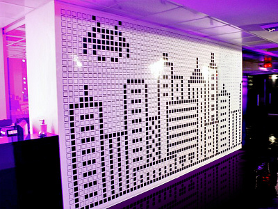 Wall of pixels black white interior design invader pixel wall