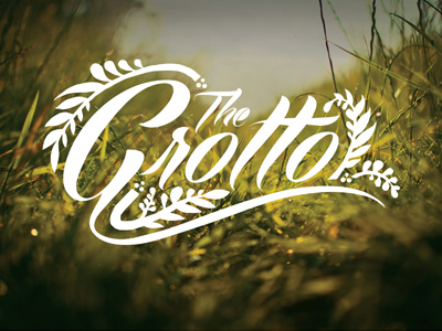 Grotto Logo calligraphy field grass green hand drawn leaves typography white